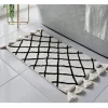Tapis de bain pompons blanc/noir